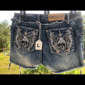 NEW with tags, Platinum Plush Skull Bling Shorts with Side Ties.
Size large